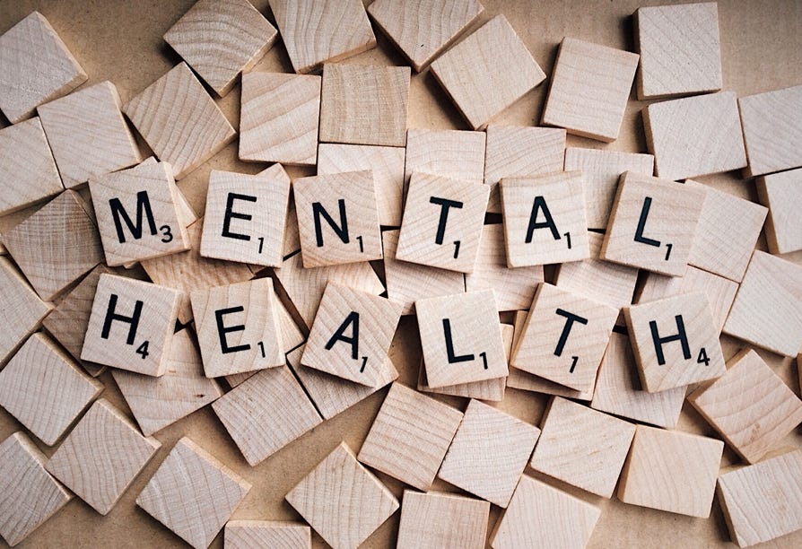 Wooden blocks spelling out Mental Health