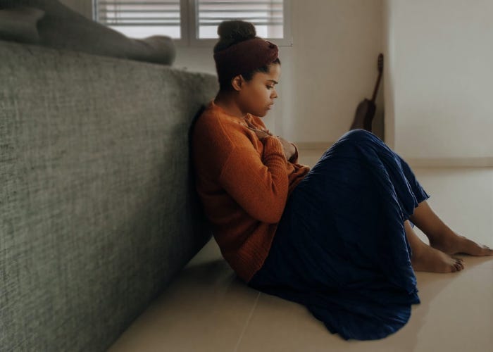 A woman suffering anxiety alone.