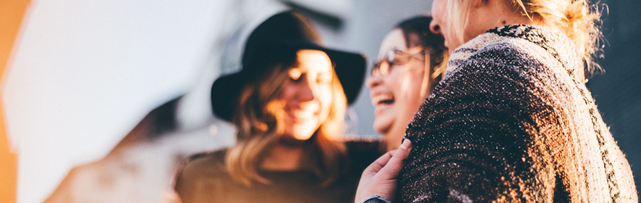 Three women laughing and having a good time